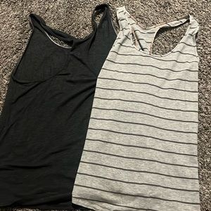TWO lululemon racerback tanks luon fabric size 6 form fitting.